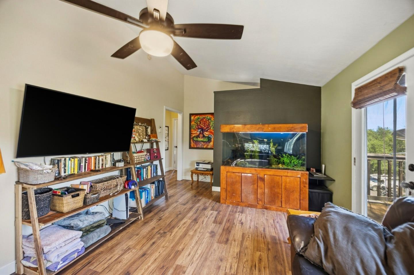 2353 Stagecoach Canyon Road Pope Valley, CA 94567 - Photo 7 of 46 a living room with furniture and a flat screen tv