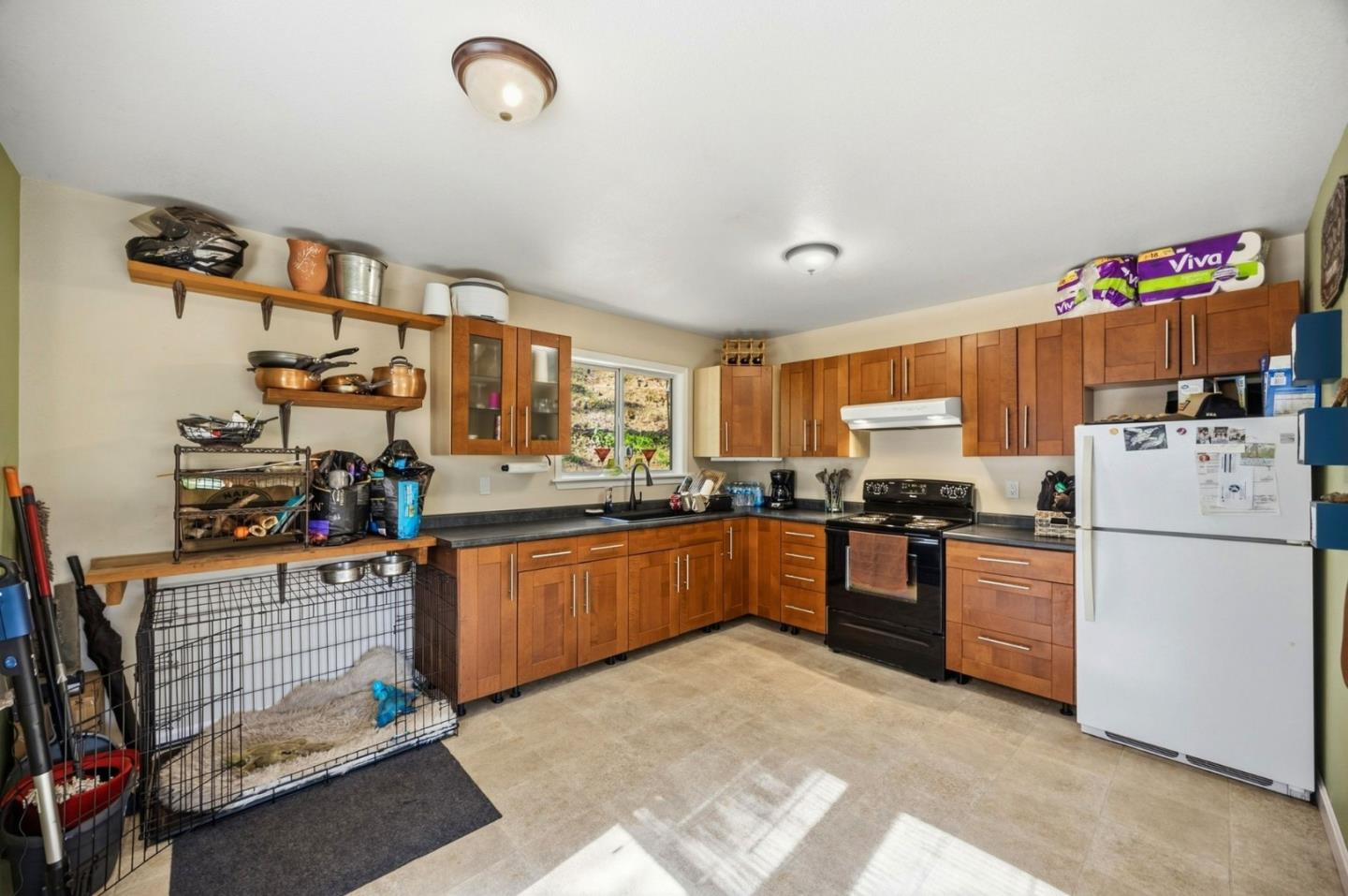 2353 Stagecoach Canyon Road Pope Valley, CA 94567 - Photo 8 of 46 a kitchen with stainless steel appliances granite countertop a refrigerator sink and stove
