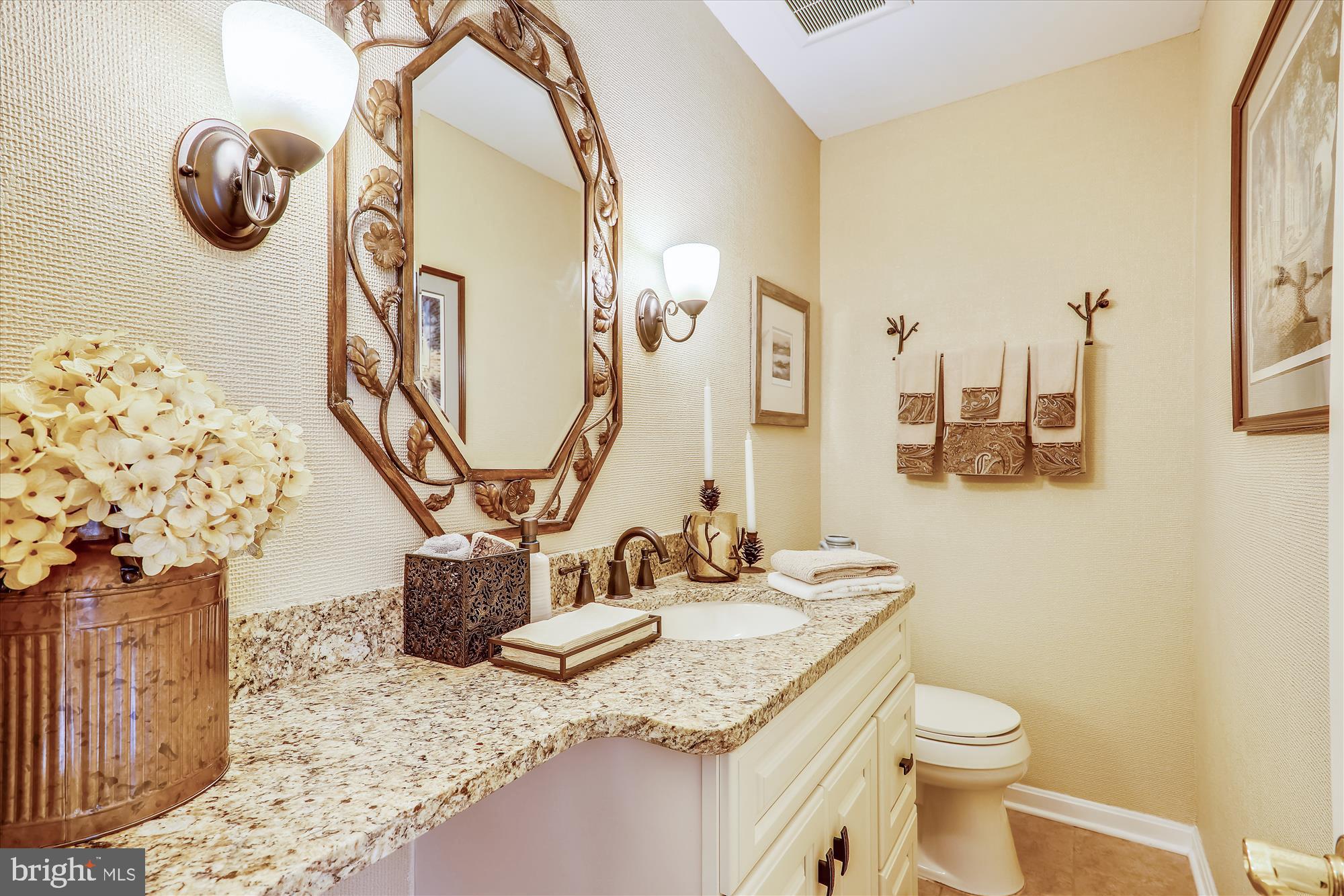 8712 Granite Lane Laurel, MD 20708 - Photo 30 of 48 Half bath on main lvl with granite vanity
