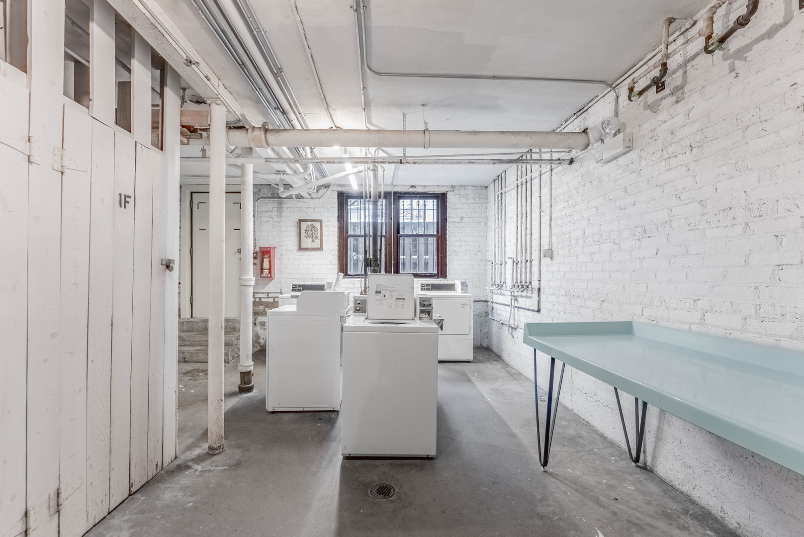 6430 North Glenwood Avenue, Unit G4 Chicago, IL 60626 - Photo 25 of 33 a view of a dining room with furniture a chandelier and wooden floor