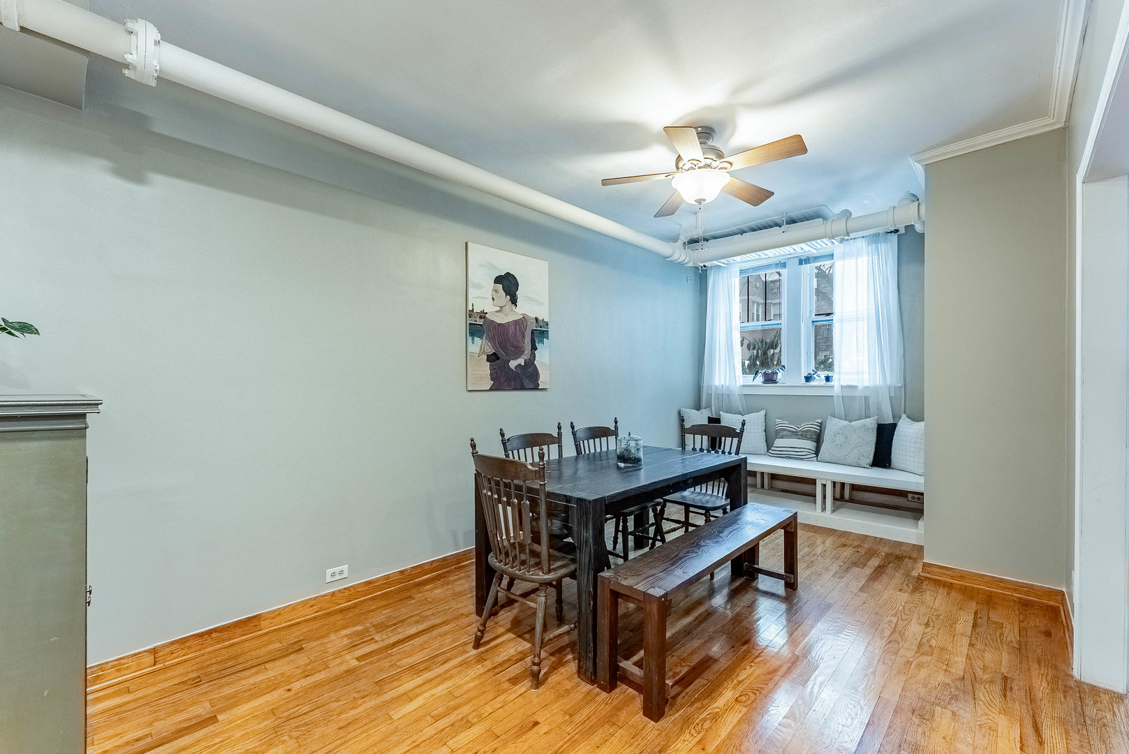 6430 North Glenwood Avenue, Unit G4 Chicago, IL 60626 - Photo 10 of 33 a view of a workspace with furniture and wooden floor