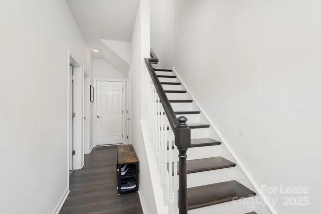 a view of entryway with wooden floor