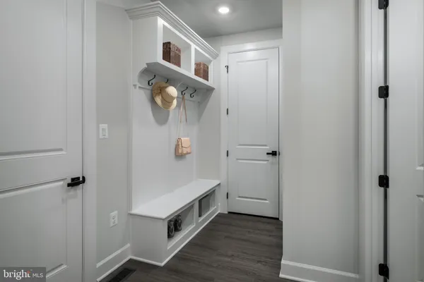 a bathroom with a shower and mirror