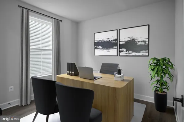 a room with a table and chairs