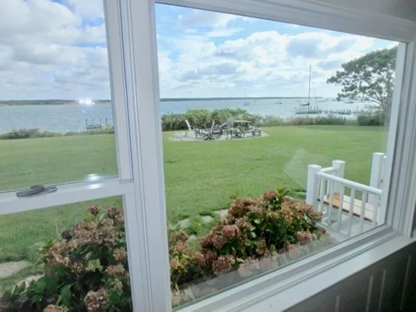 a view of a lake from a window