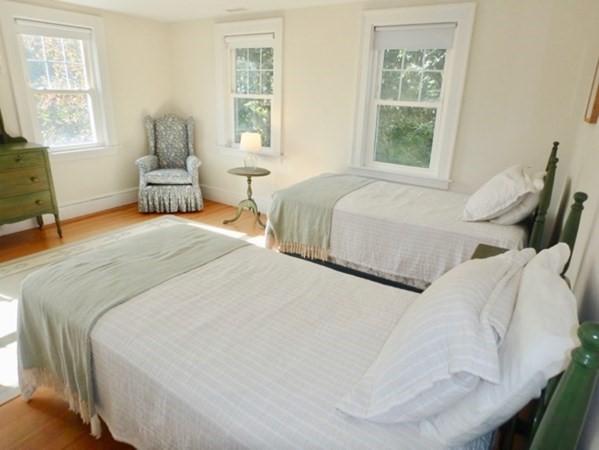 17 Edgartown Bay Road Edgartown, MA 02539 - Photo 26 of 31 a bedroom with two beds and large window
