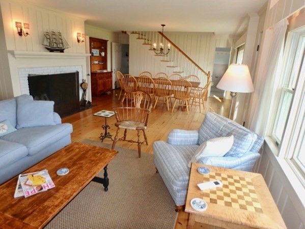 17 Edgartown Bay Road Edgartown, MA 02539 - Photo 3 of 31 a living room with furniture and a fireplace