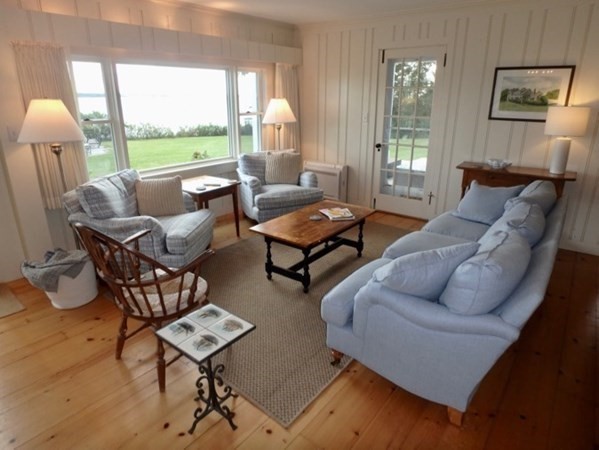 17 Edgartown Bay Road Edgartown, MA 02539 - Photo 8 of 31 a living room with furniture and a large window