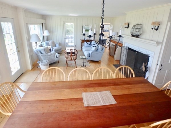 17 Edgartown Bay Road Edgartown, MA 02539 - Photo 10 of 31 a living room with furniture and a fireplace