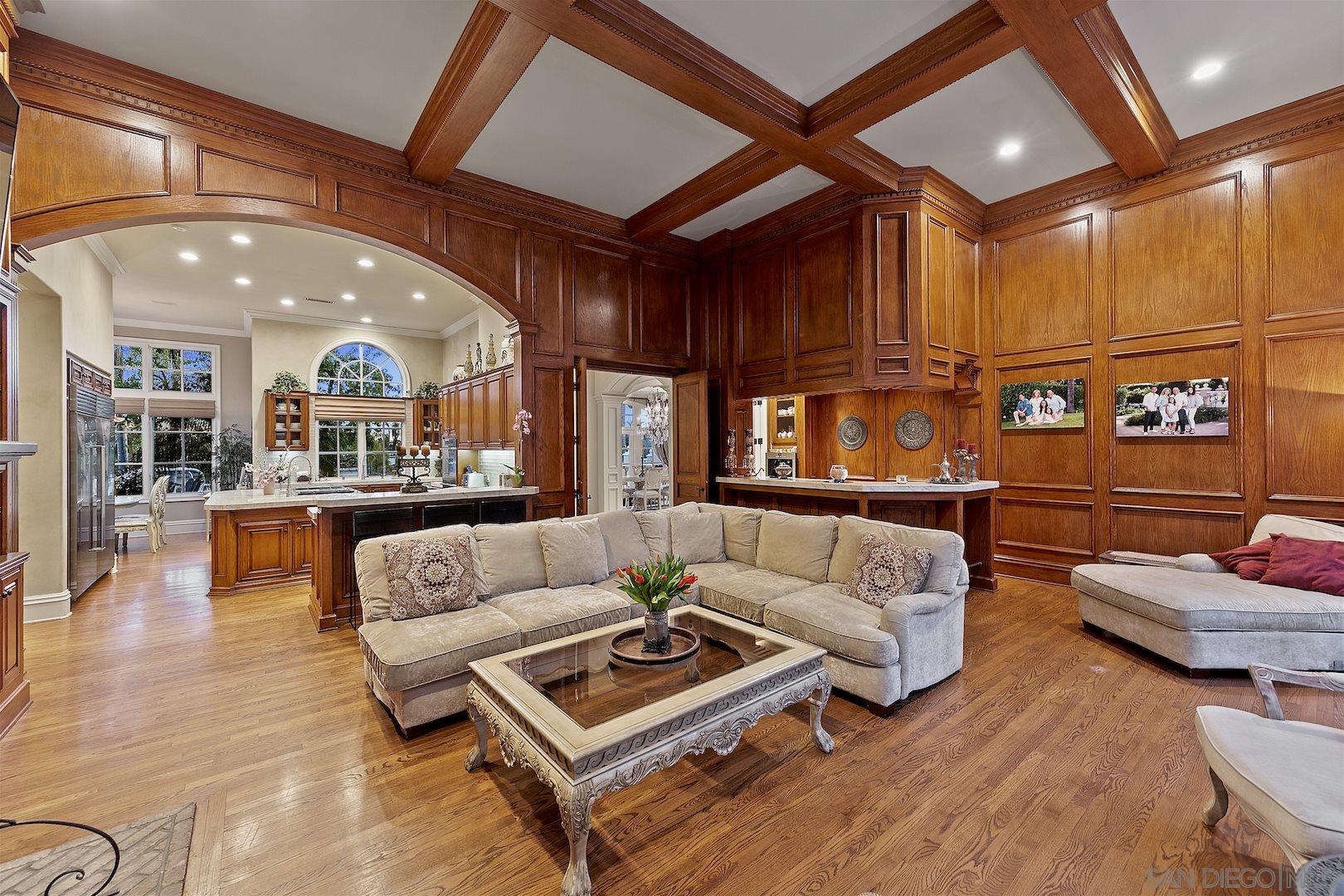 7583 St Andrews Road Rancho Santa Fe, CA 92067 - Photo 15 of 29 a living room with furniture ceiling fan and a rug