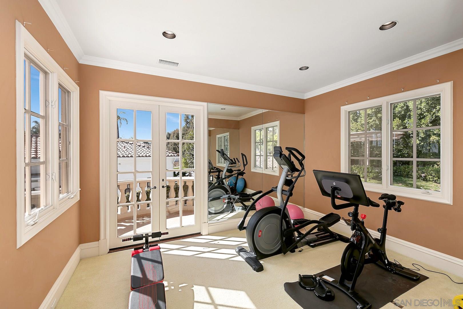 7583 St Andrews Road Rancho Santa Fe, CA 92067 - Photo 10 of 29 a view of a room with gym equipment