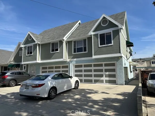 a car parked in front of a house