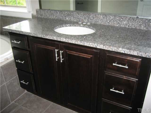 2133 Lower Lake Road Wake Forest, NC 27587 - Photo 12 of 25 Deluxe Master Bath, has Separate vanity's with Granite countertops. Master Bath/Spa