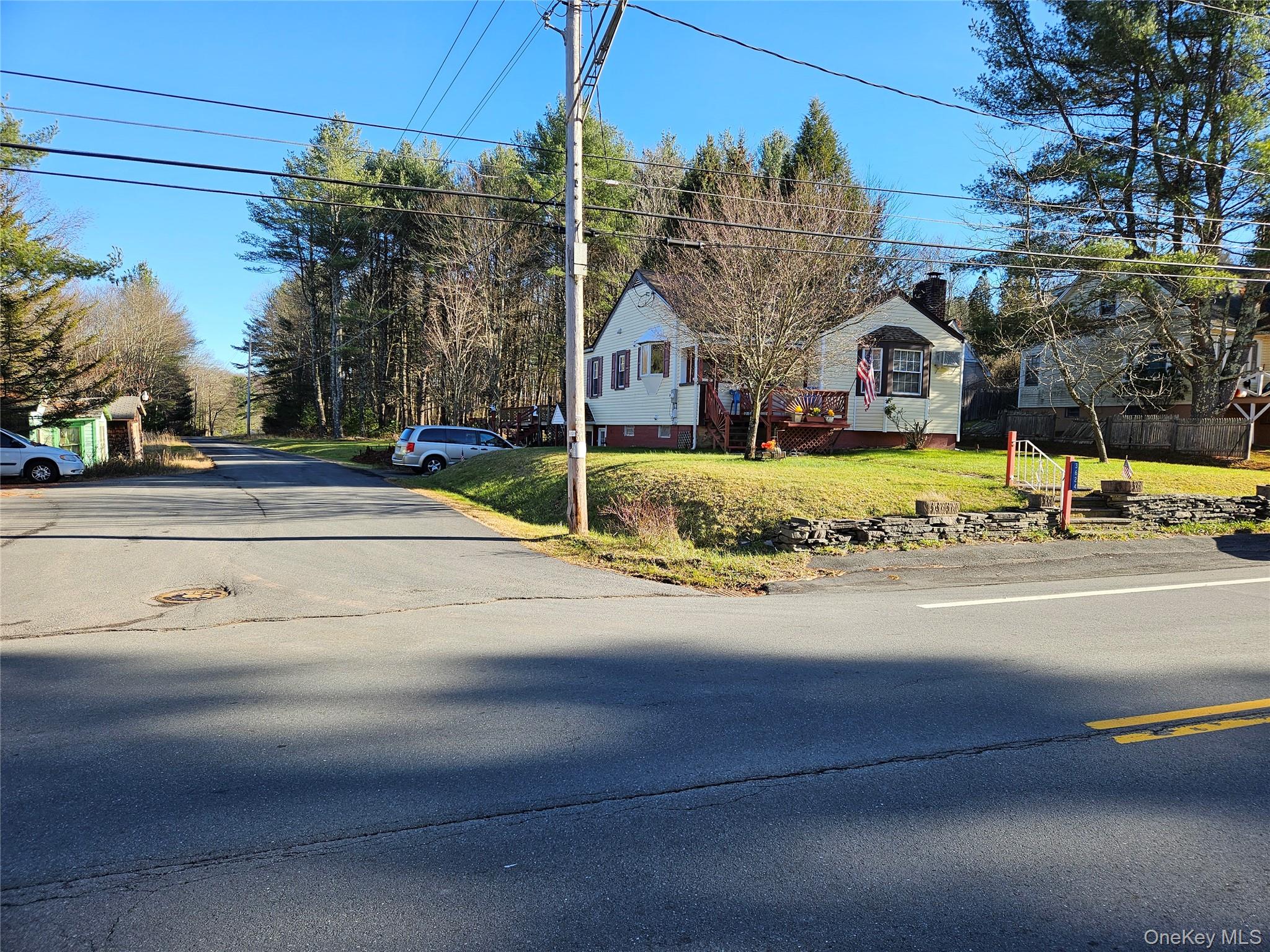 3624 State Rte 55 Kauneonga Lake, NY 12749 - Photo 1 of 40 a building with trees in front of it
