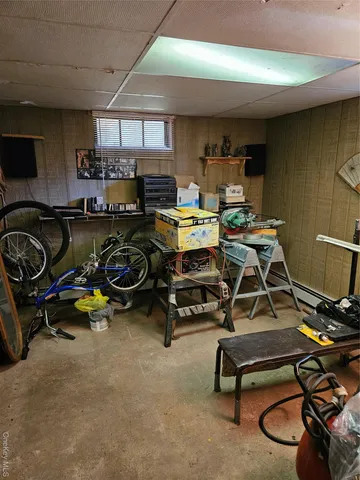 a view of a playground with basketball court