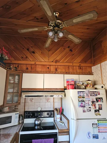 a bed room with a bed and a window