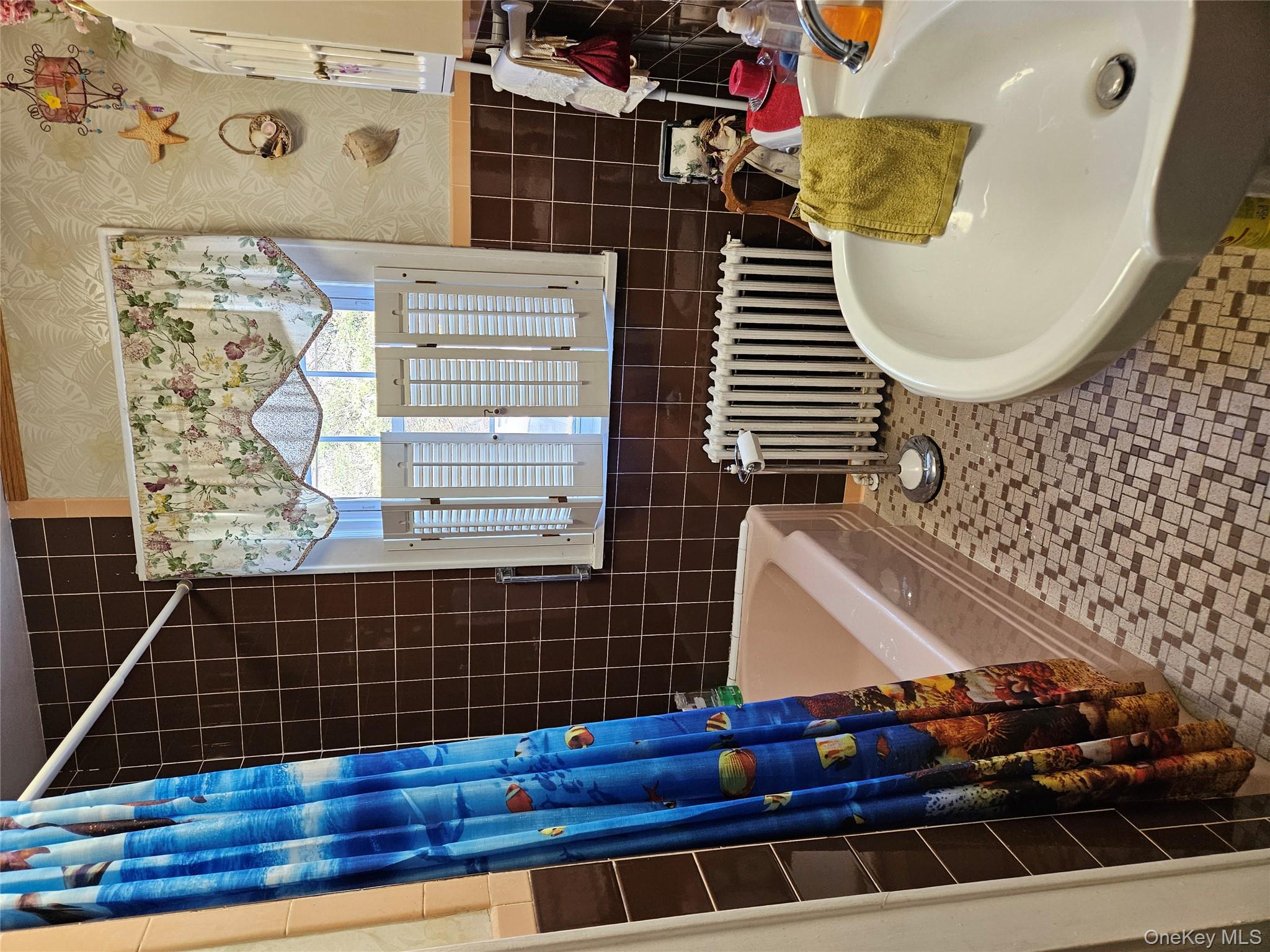 3624 State Rte 55 Kauneonga Lake, NY 12749 - Photo 37 of 40 a bathroom with a bathtub and a shower