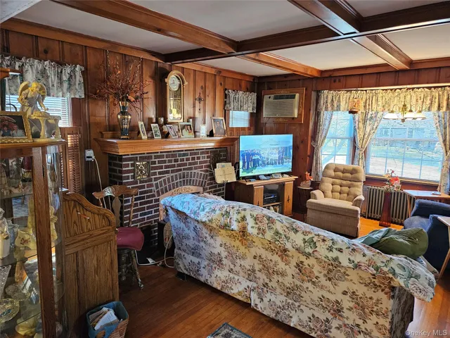 a bedroom with bed and a window