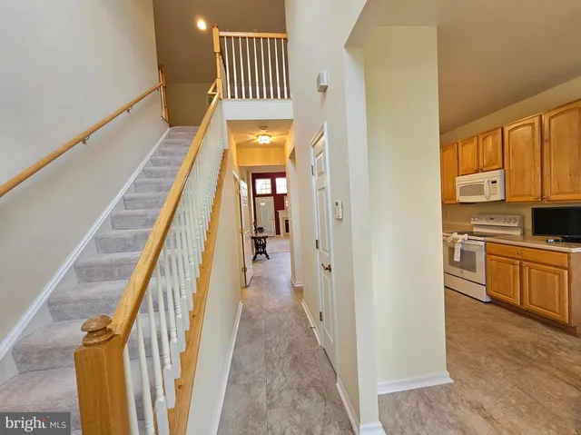 a view of a kitchen from the hallway