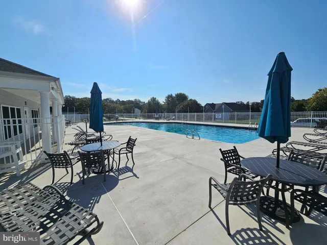 a view of a terrace with furniture