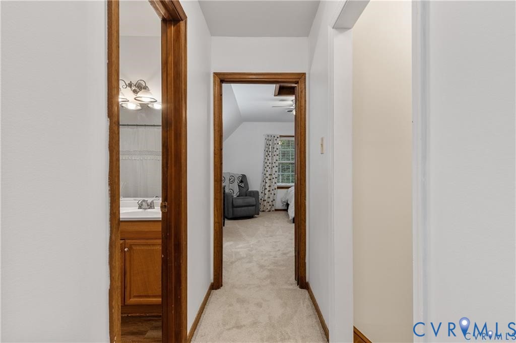 13501 Buck Rub Drive Midlothian, VA 23112 - Photo 13 of 35 a view of a bathroom from a hallway