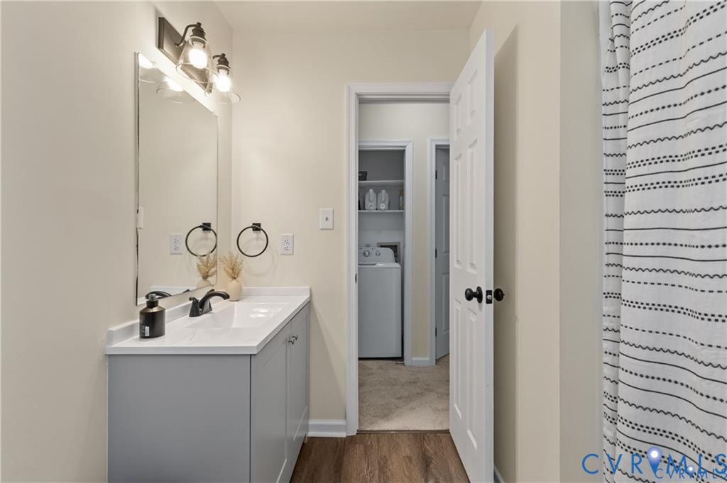 13501 Buck Rub Drive Midlothian, VA 23112 - Photo 18 of 35 a bathroom with a sink and a mirror