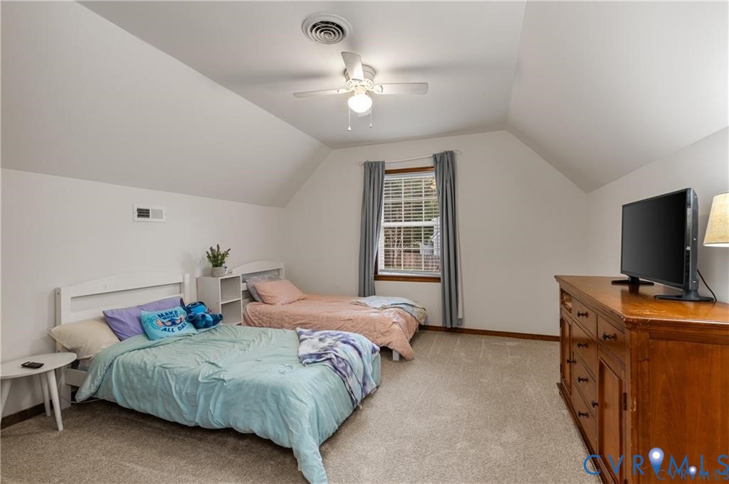 13501 Buck Rub Drive Midlothian, VA 23112 - Photo 25 of 35 a bedroom with a bed and a flat screen tv