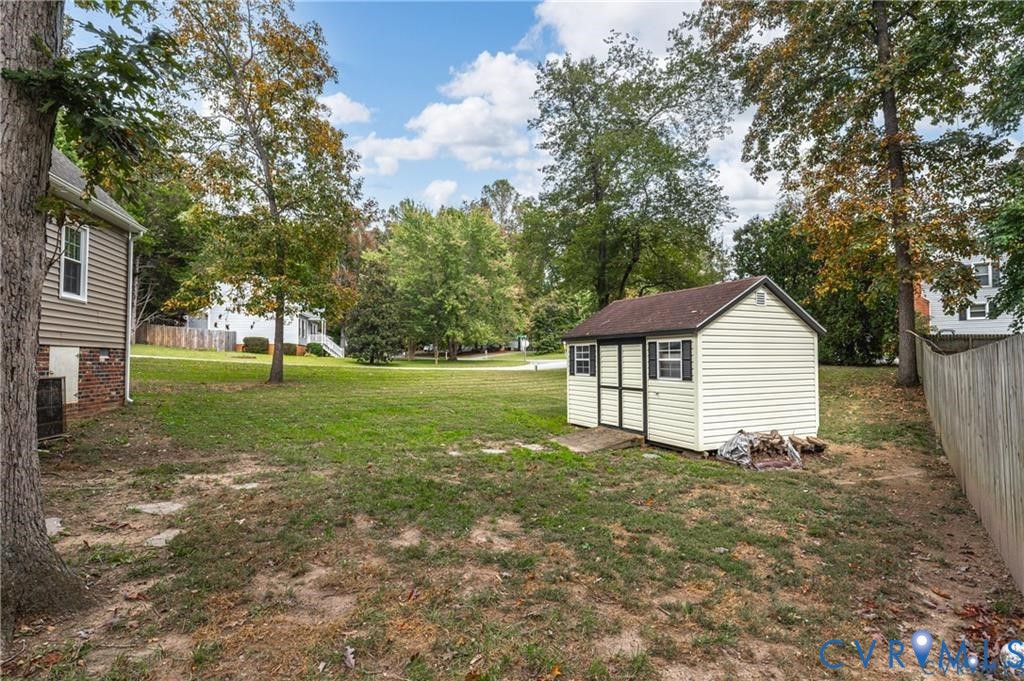 13501 Buck Rub Drive Midlothian, VA 23112 - Photo 28 of 35 a view of a house with yard and a tree