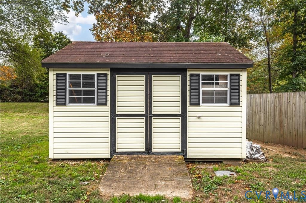 13501 Buck Rub Drive Midlothian, VA 23112 - Photo 29 of 35 a view of a house with a yard and garage