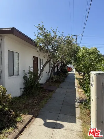a house view with a garden space