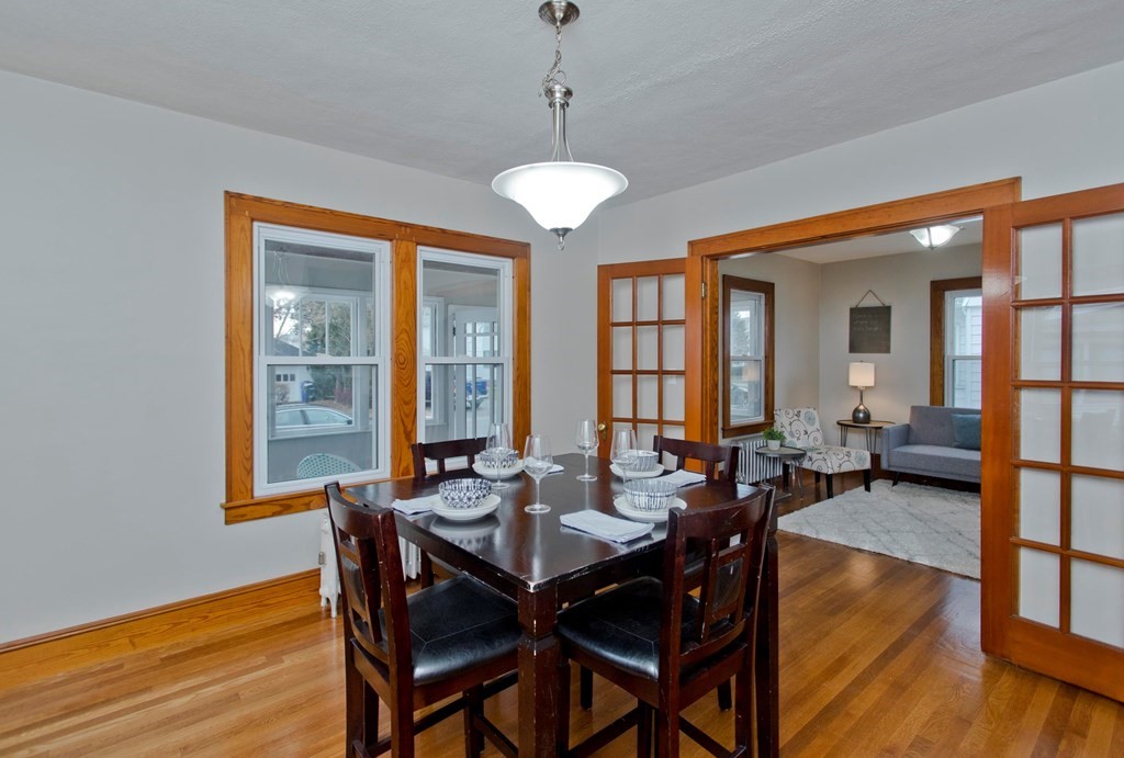 29 Acton Street Springfield, MA 01151 - Photo 13 of 39 a view of a dining room with furniture window and wooden floor