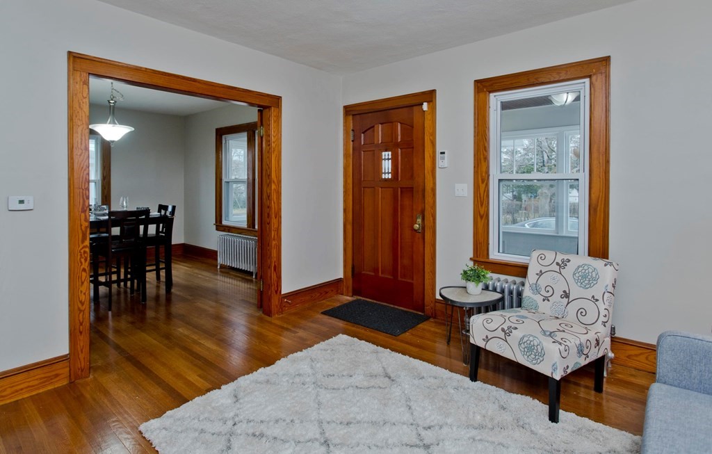 29 Acton Street Springfield, MA 01151 - Photo 19 of 39 a living room with furniture and wooden floor
