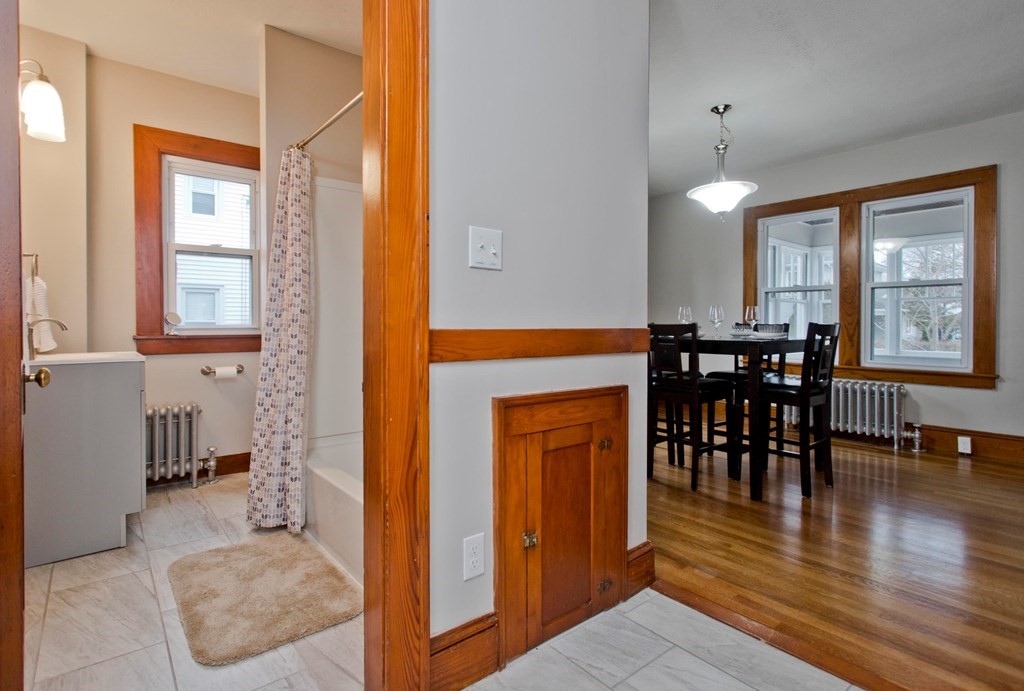 29 Acton Street Springfield, MA 01151 - Photo 21 of 39 a view of a livingroom with furniture window and wooden floor