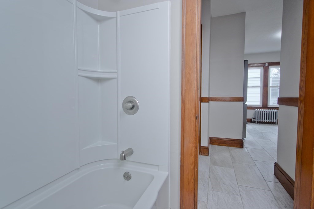 29 Acton Street Springfield, MA 01151 - Photo 24 of 39 a bathroom with a tub