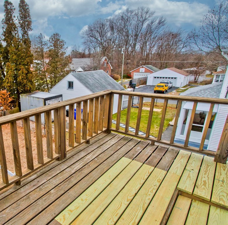 29 Acton Street Springfield, MA 01151 - Photo 39 of 39 a view of wooden balcony with wooden floor