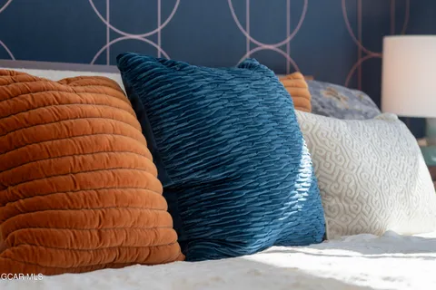 a bathroom with a sink double vanity and a mirror
