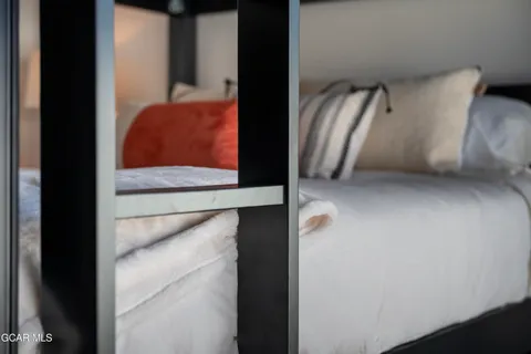 a view of cabinets and wooden floor