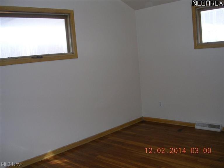 9201 Reichert Road Parma, OH 44130 - Photo 7 of 11 all bedrooms have hard wood floors and have been freshly painted