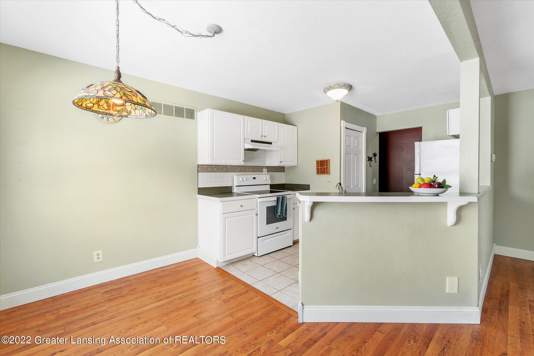 3926 Hunters Ridge Drive, Unit 2 Lansing, MI 48911 - Photo 6 of 28 10-3926-Hunters-Ridge-Dr-WindowStill-Rea