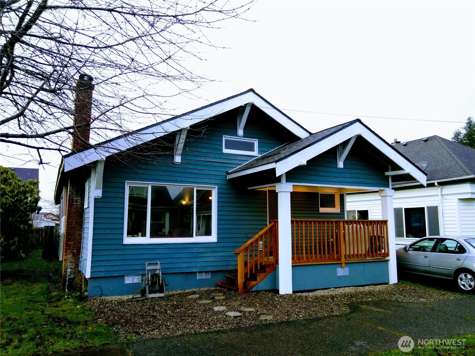 211 Garfield Street Hoquiam, WA 98550 - Photo 1 of 26 a front view of a house with yard