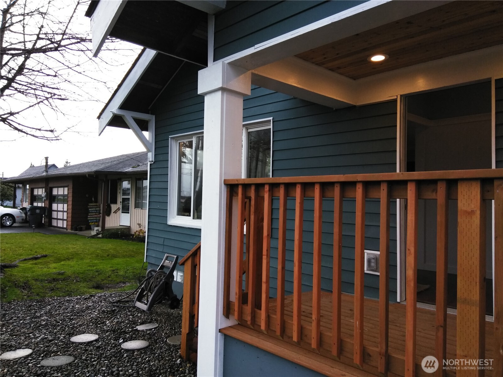 211 Garfield Street Hoquiam, WA 98550 - Photo 2 of 26 a view of a porch with a backyard