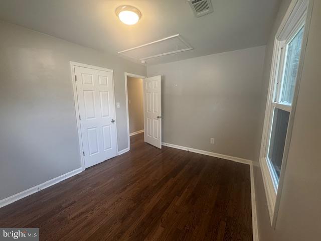 12250 Short Street Remington, VA 22734 - Photo 6 of 10 an empty room with wooden floor and windows