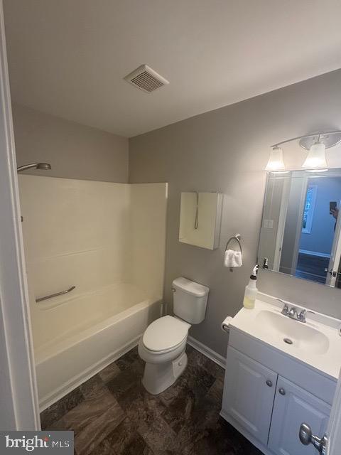 12250 Short Street Remington, VA 22734 - Photo 7 of 10 a bathroom with a sink a toilet and shower