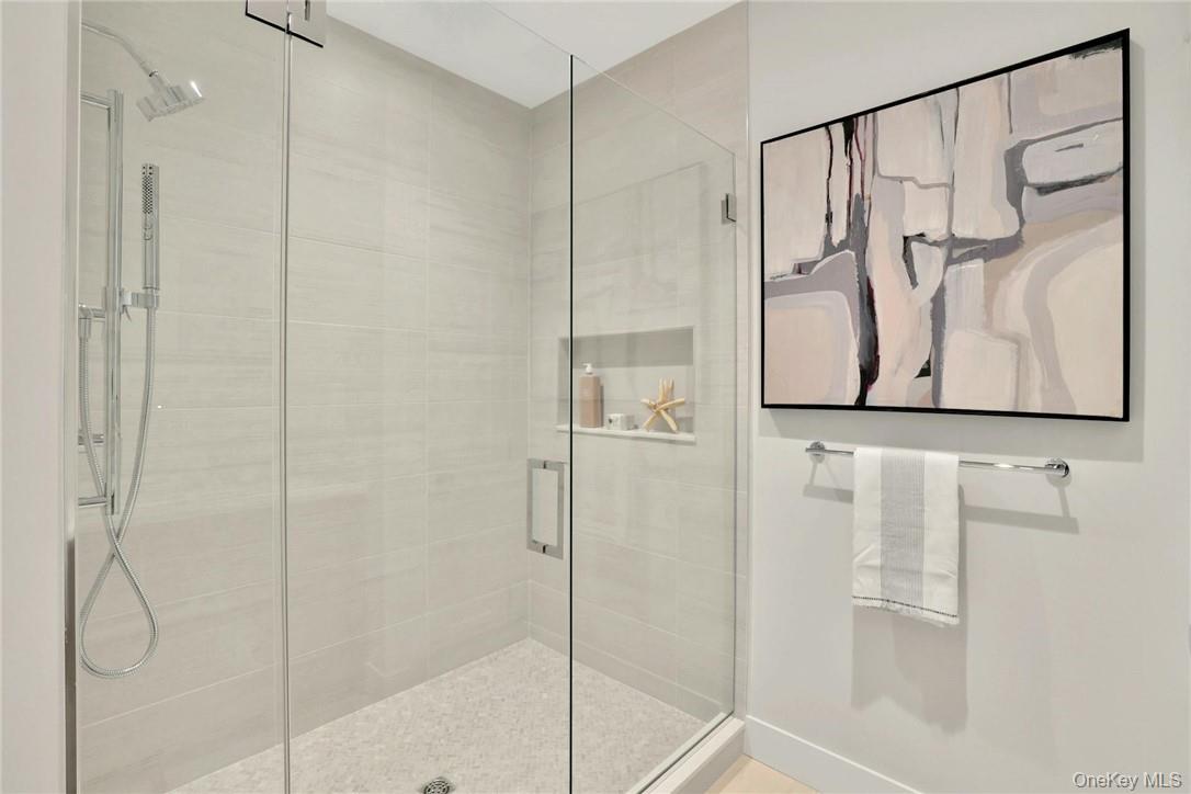 162 Bedford Road, Unit 16 Armonk, NY 10504 - Photo 14 of 37 a bathroom with a shower