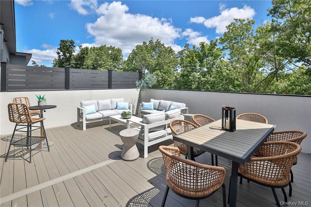 162 Bedford Road, Unit 16 Armonk, NY 10504 - Photo 27 of 37 a view of a patio on the roof deck