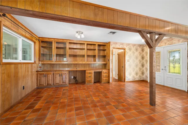 a view of a livingroom with furniture and fireplace