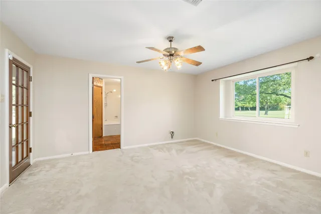 a bathroom with a double vanity sink a mirror and a shower