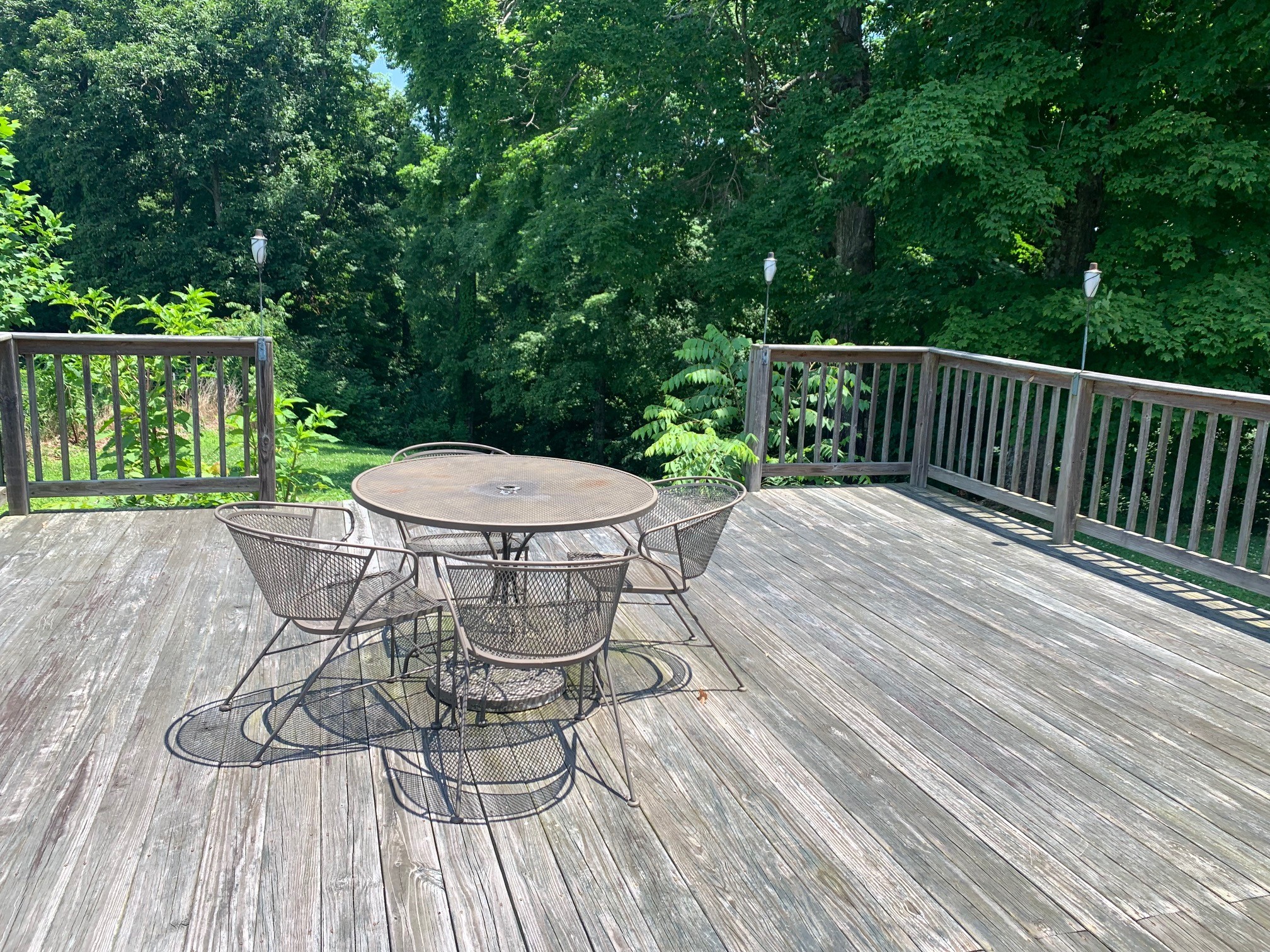 818 Dale Ridge Road Dowelltown, TN 37059 - Photo 20 of 24 a view of a table and chairs on the roof deck