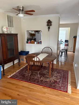a kitchen with stainless steel appliances a stove a sink and a refrigerator