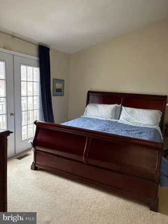 a bathroom with a sink a mirror and a bathtub